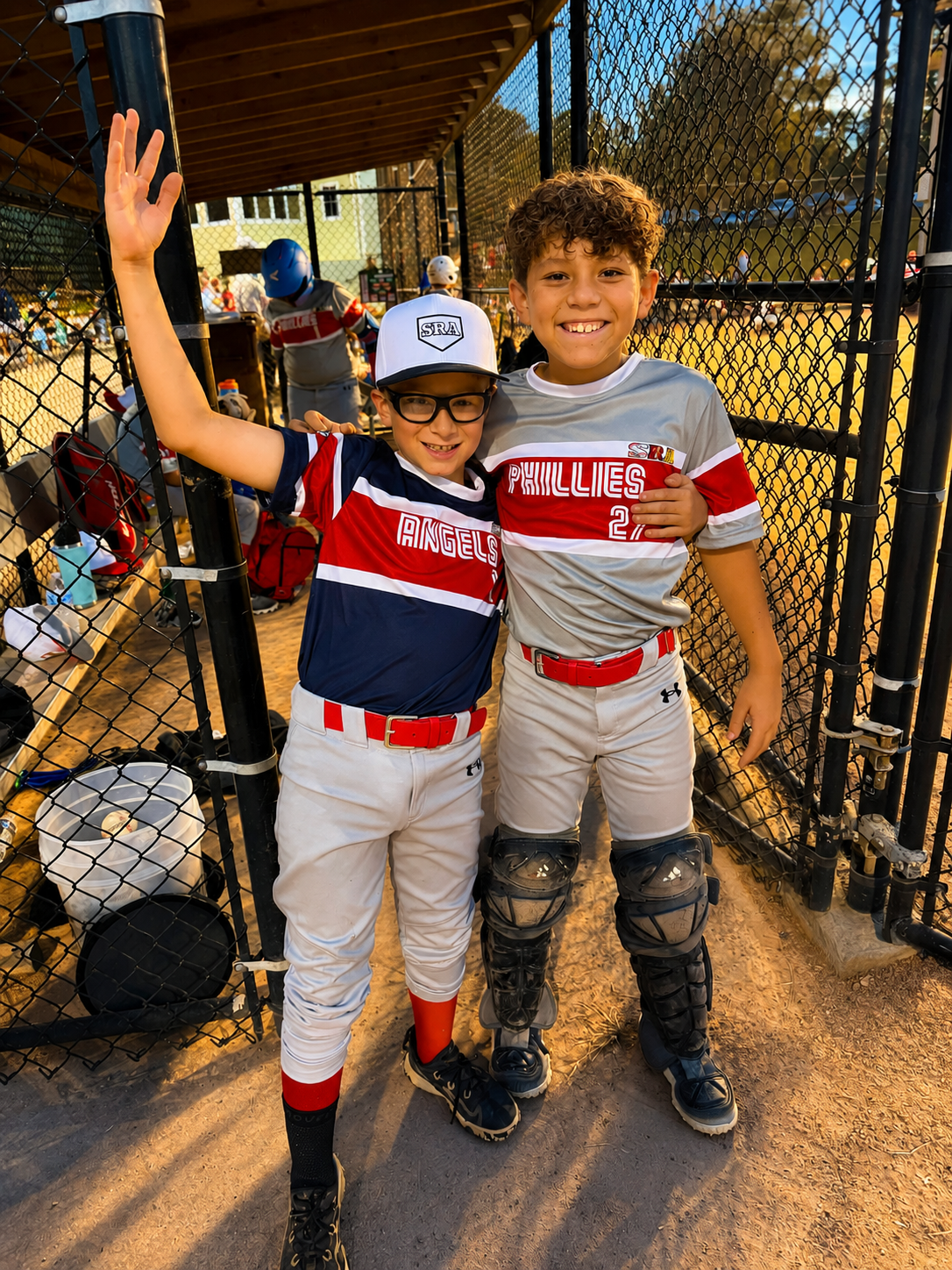 SRA baseball teammates in the dugout