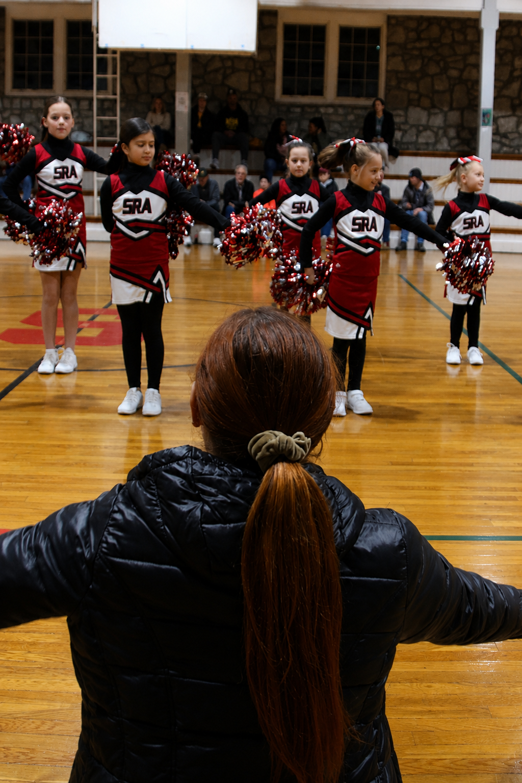 SRA cheerleaders practicing
