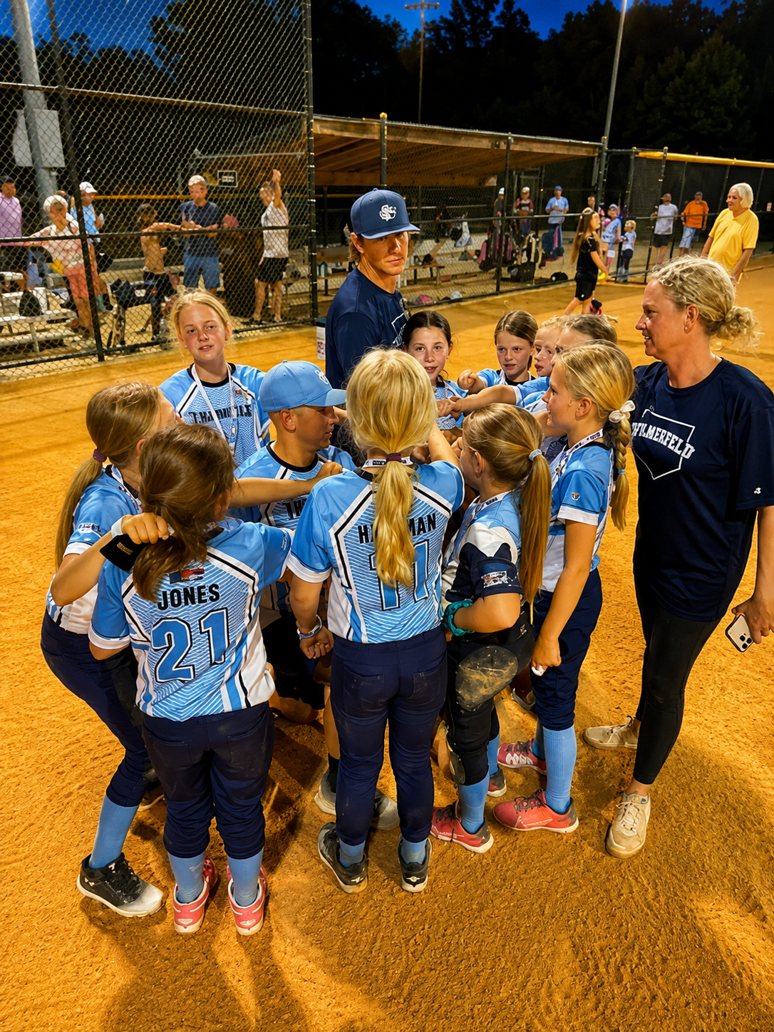 SRA softball team huddle